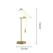 Lampe à poser design oiseau doré