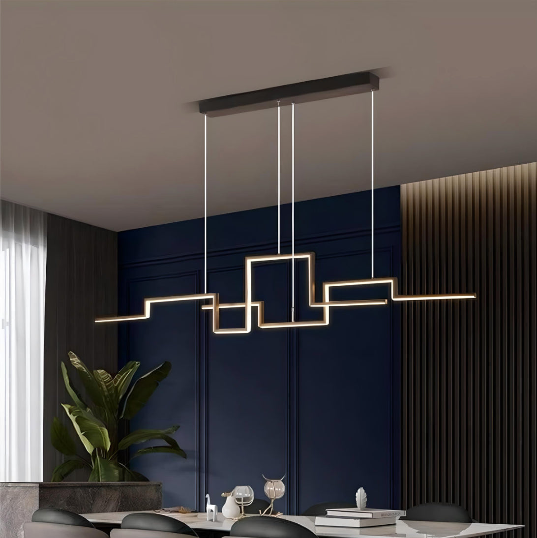Suspension luminaire moderne à forme angles droits disposé au dessus d'une table