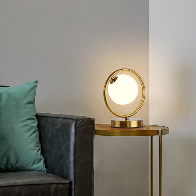 Lampe à poser design LED en métal doré