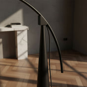 Modern black arc floor lamp | GRAVIT