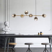 Suspension luminaire verre | CABARET-Or-Glowe-Studio