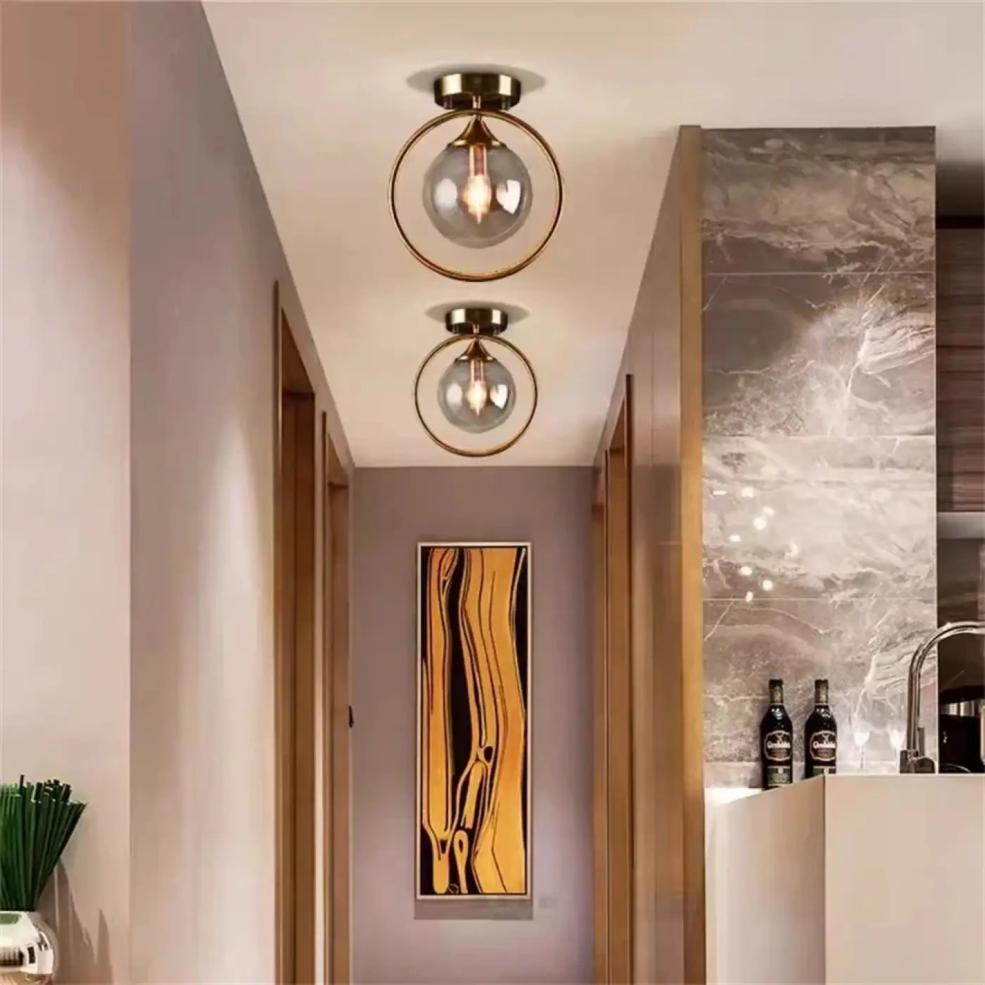 plafonnier-chic-anneau-dore-boule-lumineuse-verre-luminaires-plafond-702.webp