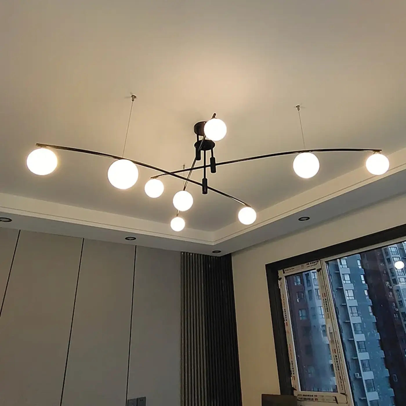 Black multi-arm ceiling light with white globes | KOGO