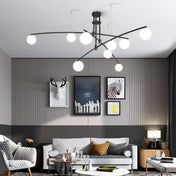 Black multi-arm ceiling light with white globes | KOGO