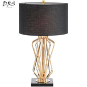 Lampe de chevet à pied design doré et abat-jour en tissu